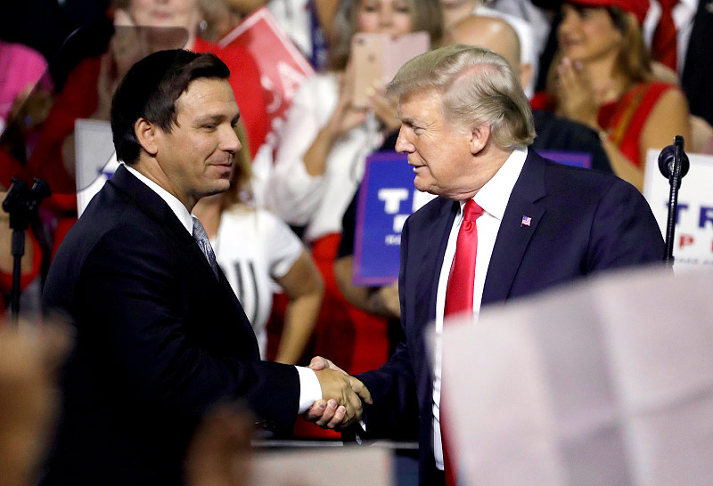 © AP/Chris O'Meara Ron DeSantis und Donald Trump